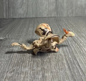 Bakugan Dharak Tan Subterra 620G Battle Brawlers Figur DNA Gundalian Invaders - Bild 1 von 7
