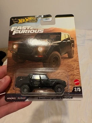 # 1/64 HOT WHEELS PREMIUM - LAMBORGHINI LM002 NERS serie FAST AND FURIOUS # - Immagine 1 di 3