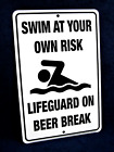 SWIM AT YOUR OWN RISK - *US MADE* Embossed Metal Tin Sign - Man Cave Garage Bar