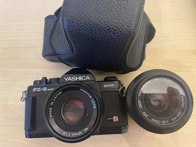 Yashica FX-3 Super 2000 35mm film camera reflex analogica + 50mm + zoom 35-70mm - Immagine 1 di 4
