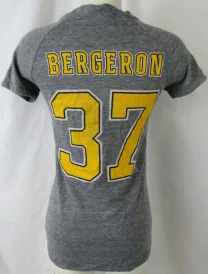 Camiseta Boston Bruins Mujer S Envejecida Proyección Patrice Bergeron #37 ABRU 76 Foto 1 de 4