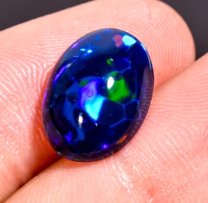 4 Ct Dazzling Fire Black Ethiopian Opal Oval Shape Opal Gemstone 13X10X5 mm - Picture 1 of 5