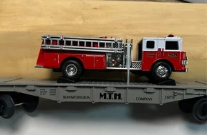 Camión de bomberos Rail King MTH 30-7629 transporte automático carro plano Ertl - Imagen 1 de 16