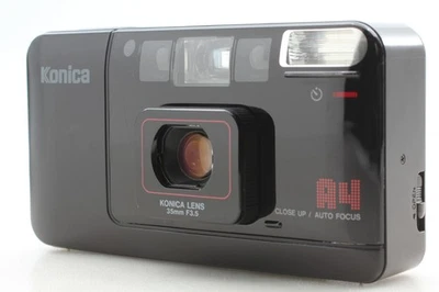 LCD funciona! [Casi COMO NUEVA] Cámara fotográfica Konica GRANDE Mini A4 apuntar y disparar 35 mm JAPÓN Foto 1 de 4