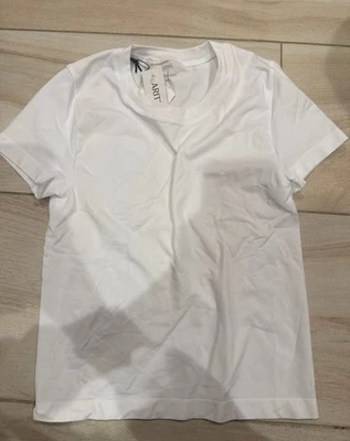 Camiseta sin mangas Aritzia Babaton blanca sin costuras ceñida al cuerpo Bowie, talla XS/S Foto 1 de 2