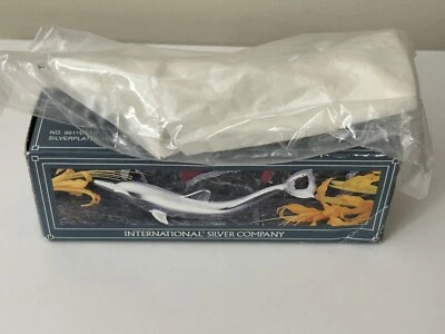 Abrebotellas Dolphin Plateado 1994 International Silver Beach Bar Nuevo Foto 1 de 4