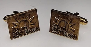 Gemelos publicitarios vintage tono dorado Salud San Diego Sun Taco Catering - Imagen 1 de 3