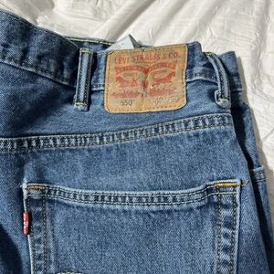 Levis 550 Jeans Mens 42X30 Blue Relaxed Fit Tapered Leg Red Tab Denim Pants Logo - Picture 1 of 8