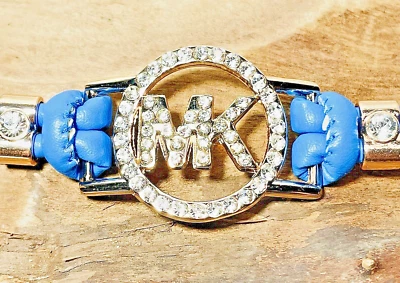 Authentic Michael Kors Gold Tone MK Logo Blue Leather Bracelet W Crystal Accents - Image 1 of 4