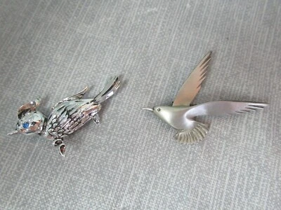 2 prendedores de moda - tono plateado con ojo de piedra verde y gaviota marina de peltre - 17 209 Foto 1 de 4