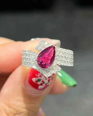 Simulated 2.23TCW Pear Pink Ruby & Round Sapphire Modern Design Engagement Ring - Image 1 of 4