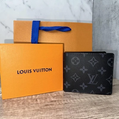 Cartera Louis Vuitton ligeramente usada para hombre de lona de cuero en negro usada (sin bolsa) Foto 1 de 4
