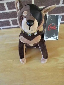 Peluche "guiño" perro cruella película Disney 11" sentado colores marrones parche collar - Imagen 1 de 4