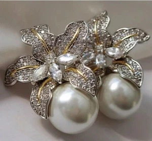 Pendientes Zara flor color perla con delicadas hojas de plata precio de venta - Imagen 1 de 4