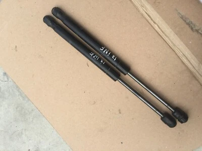 JUEGO DE PUNTAL AMORTIGUADOR TRASERO IZQUIERDO/DERECHO 2010-2013 INFINITI G37 OEM Foto 1 de 4