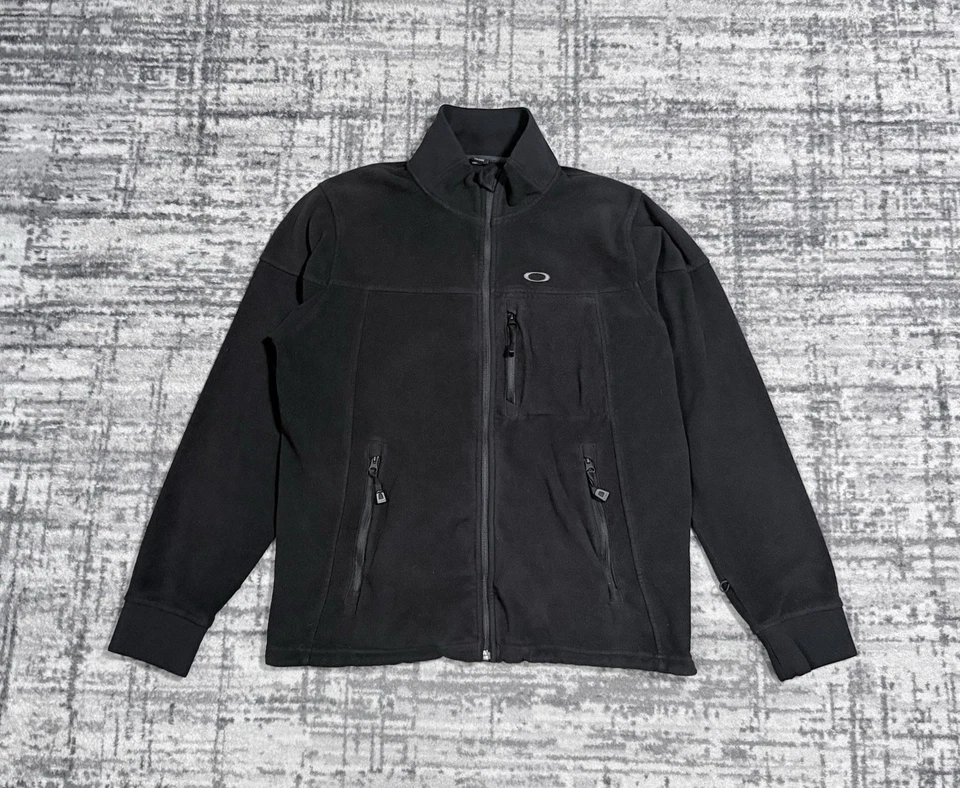 Chaqueta polar vintage Y2K Oakley cremallera completa logotipo Gorpcore negra para hombre talla M Foto 1 de 4