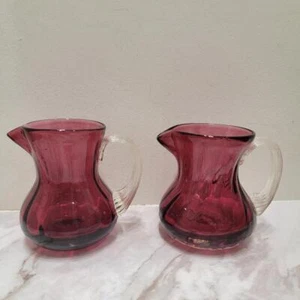 Pair Vintage Cranberry Glass Creamer Cream Pitchers w/ Clear Applied Handle - Picture 1 of 4