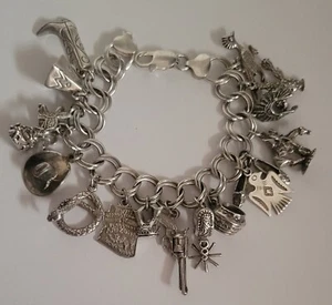 Vintage geladen Sterlingsilber Bettelarmband Western Motiv, 17 Charms, 7" lang - Bild 1 von 6