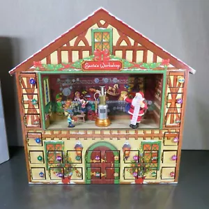 MR CHRISTMAS ADVENTSKALENDER HAUS - ANIMIERTE MUSIK SPIELT 24 LIEDER - TOP - Bild 1 von 11