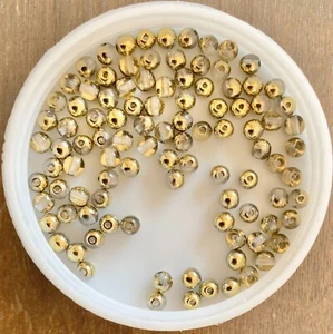 Czech Pressed Glass Druk Beads. Crystal Amber. 4mm. 100/pack. - Picture 1 of 1