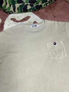 Nuovo logo A Bathing Ape Bape testa di pirata beige marrone tasca T L Undftd Stussy Made - Foto 1 di 9
