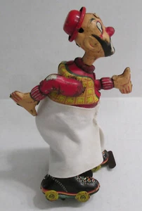 Vintage Rollschuh Hobo Clown Aufzieh Blech Litho Spielzeug TPS Japan - Bild 1 von 4