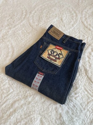Pantalones de mezclilla Levi’s 505 44x30 naranja lengüeta pierna recta azul EE. UU. Stock muerto nuevos con etiquetas Foto 1 de 4