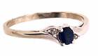 10 Karat White Gold Contemporary Sapphire Ring With Two Round Diamonds