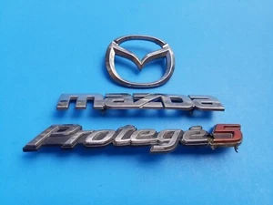 2002 2003 MAZDA PROTEGE 5 REAR CHROME EMBLEM LOGO BADGE SYMBOL 02 03 SET (2003) - Picture 1 of 7