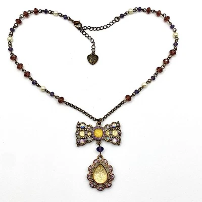 Collar colgante con lazo joya Betsey Johnson amarillo púrpura pedrería cadena con cuentas Foto 1 de 4