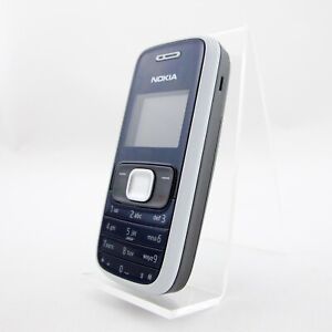 Nokia 1209 Gris-Bleu Le portable débloqué Utilisé Prépayé Excellent Très Bien