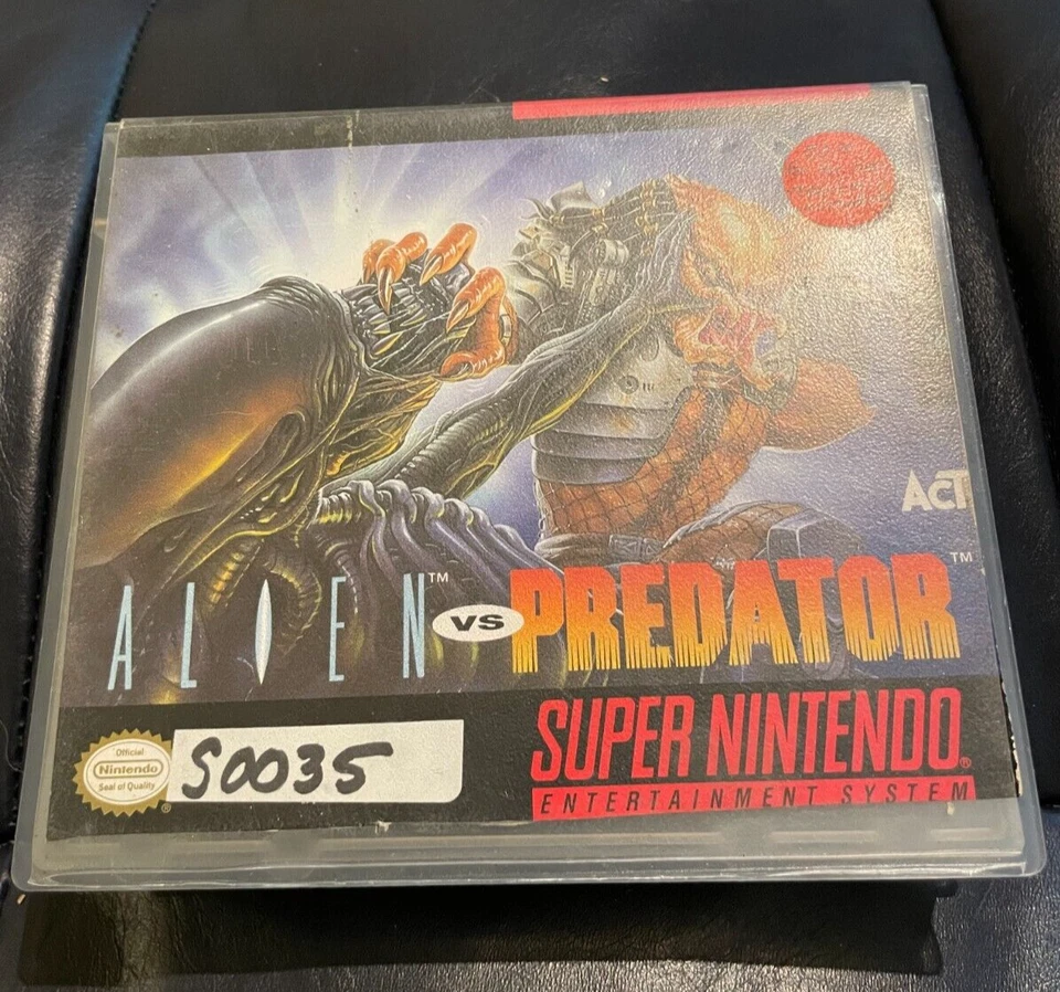 Alien Vs Predator Cartridge and manual in video store box SNES - Image 1 of 4