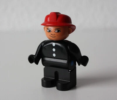 1 x Lego Duplo Feuerwehrmann-Figur mit rotem Helm, alte Version 4555, schwarze - Bild 1 von 3