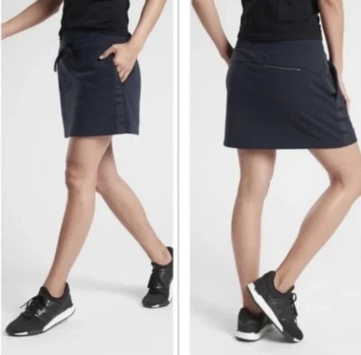 ATHLETA Metro Downtown Skort Skirt Navy Blue Upf Pockets Ribbon Hike 405665 Sz M - Image 1 of 4