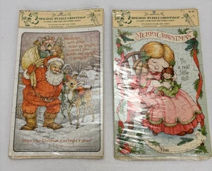 2 Vintage Hallmark Weihnachten Puzzle Karten Weihnachtsmann mit Spielzeug & Rentier; Mädchen mit Puppe 10x7 Zoll - Bild 1 von 8