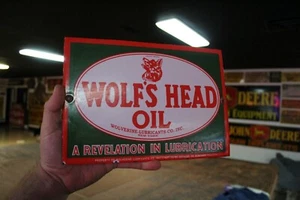 WOLF'S HEAD OIL WOLVERINE PORCELAIN SIGN SERVICE STATION GARAGE FORD GAS CHEVY - Picture 1 of 8