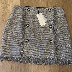 Minigonna con frange in tweed glitterato nero e grigio argento nuova con etichetta, taglia 8. Completamente foderato. - Foto 1 di 8