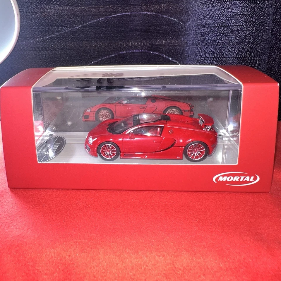 Mortal 1/64 Scale Bugatti Veyron Red Diecast Car Signed by Ed Bolian - Image 1 of 4