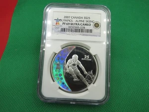 Juegos Olímpicos de Canadá 2007 $25 - Esquí alpino NGC PF 69 Ultra camafeo plata .925 - Imagen 1 de 5