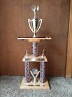 Wooden And Plastic Trophy 27" Tall 10" Long Red, Silver, And Blue Pillars
