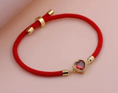 Pulsera cuerda con dije corazón de la suerte ajustable roja Foto 1 de 3