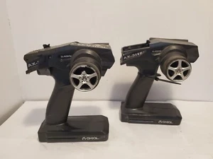2 remote control Axial AX-3 2.4GHz used for parts - (RC-0013) - Picture 1 of 11