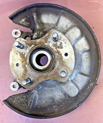 Buje lateral del conductor 86 Mazda RX7 husillo trasero izquierdo nudillo 4 orejetas 86-91 Foto 1 de 4