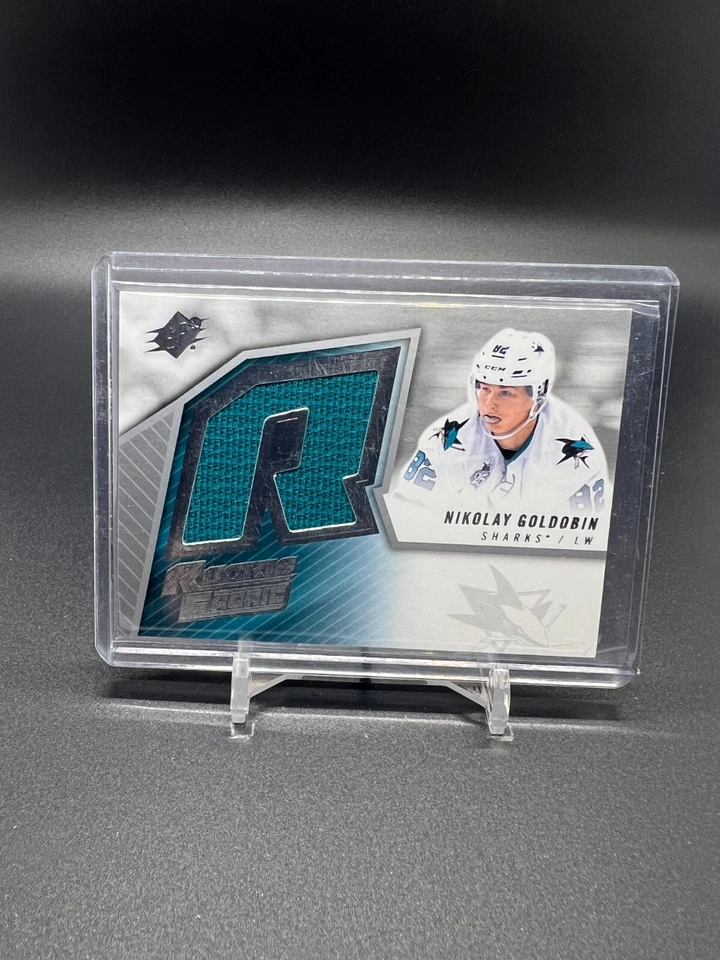 2015-16 SPx '05-06 Retro Rookie Jerseys #SPXR-NG Nikolay Goldobin RC JSY  - Image 1 of 2