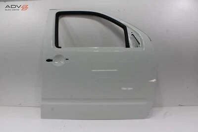 Nissan Frontier 2012-2021 panel de carcasa de puerta del lado del pasajero delantero derecho OEM Foto 1 de 4
