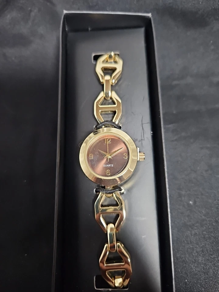 Avon Linked Watch Gold Tone Bracelet 7 3/4" L With 24 Mm Diam Case Brown Face