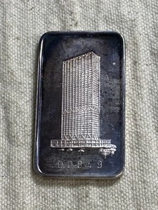 FIRST WISCONSIN CENTER MADE IN SWITZERLAND ~ 1 OZT .999 FINE SILVER BAR ART BAR - Bild 1 von 4