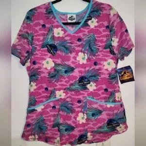 Blusa Médica Jurassic World Dominion Cuello en V Manga Corta Bolsillos Rosa Teal S - Imagen 1 de 7