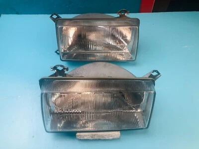 Juego faros Audi 80 B4 Hella 1AG129115 / 116 originales NOS Foto 1 de 4