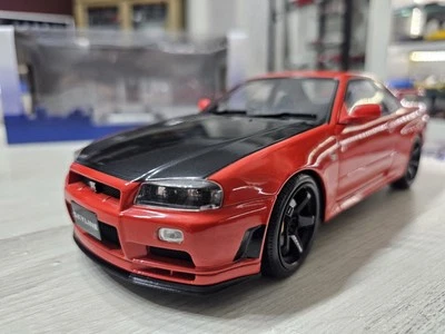 Nissan Skyline GT-R (R34) 1999 Rosso/nero 1:18 Solido - Immagine 1 di 4